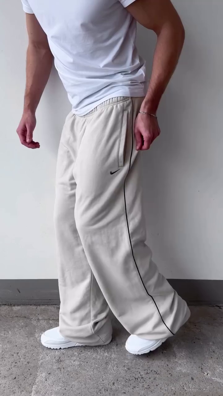 Off‑White Relaxed Wide‑Leg Track Pants with Elastic Waist and Black Side Piping for Athleisure & Lounge Wear” 🤍